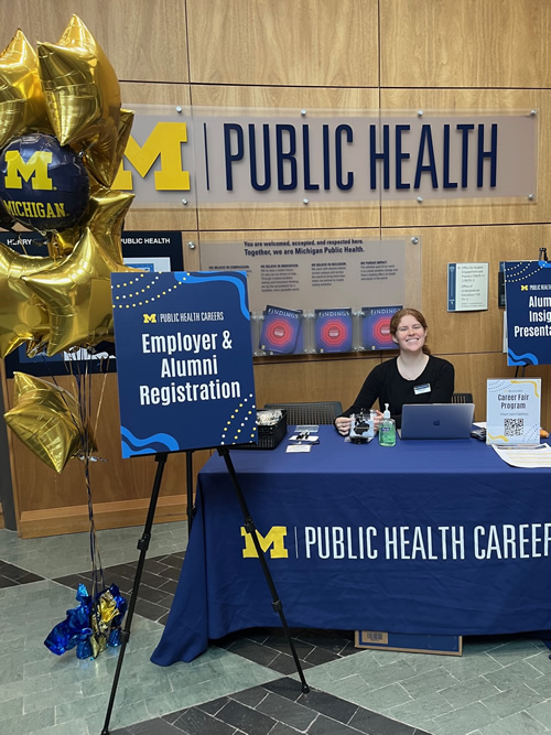 Students, employers, and staff interacting at the Michigan Public Health Career Fair