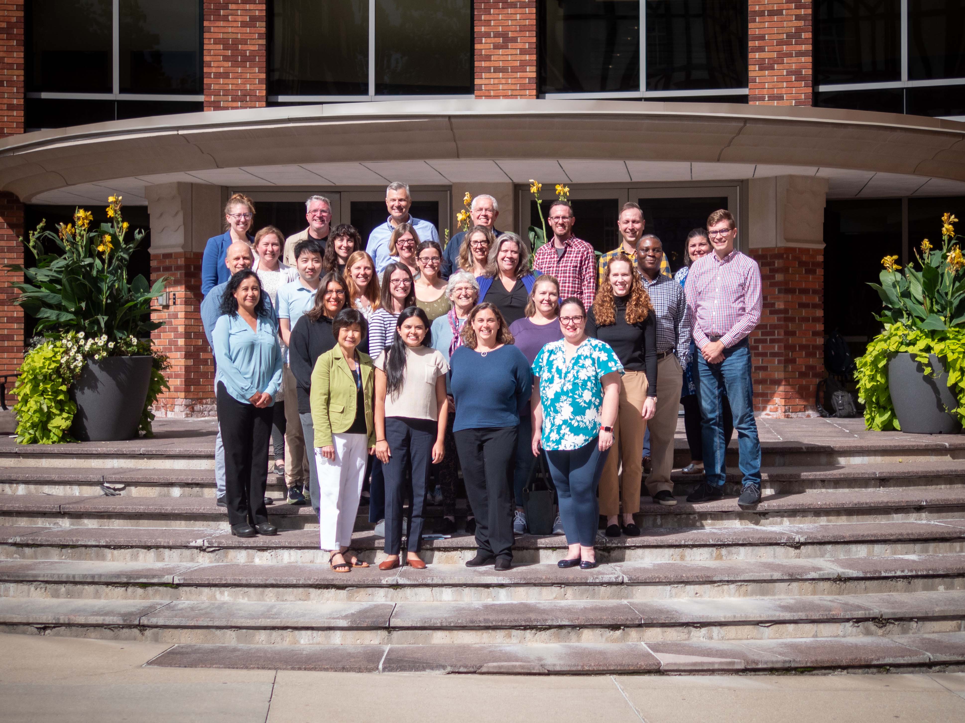 Epidemiology Faculty standing at the SPH I entrance