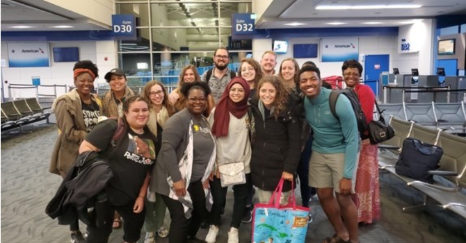 Group photo inside Detroit Metro airport