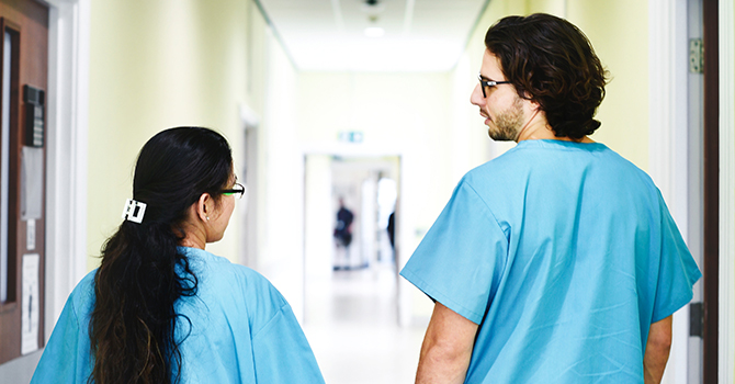 doctors talking in hallway