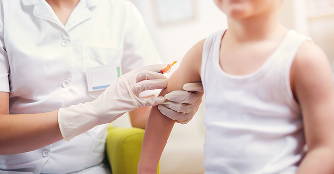 A child receiving a vaccination. 