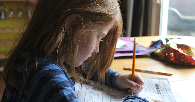 girl doing homework