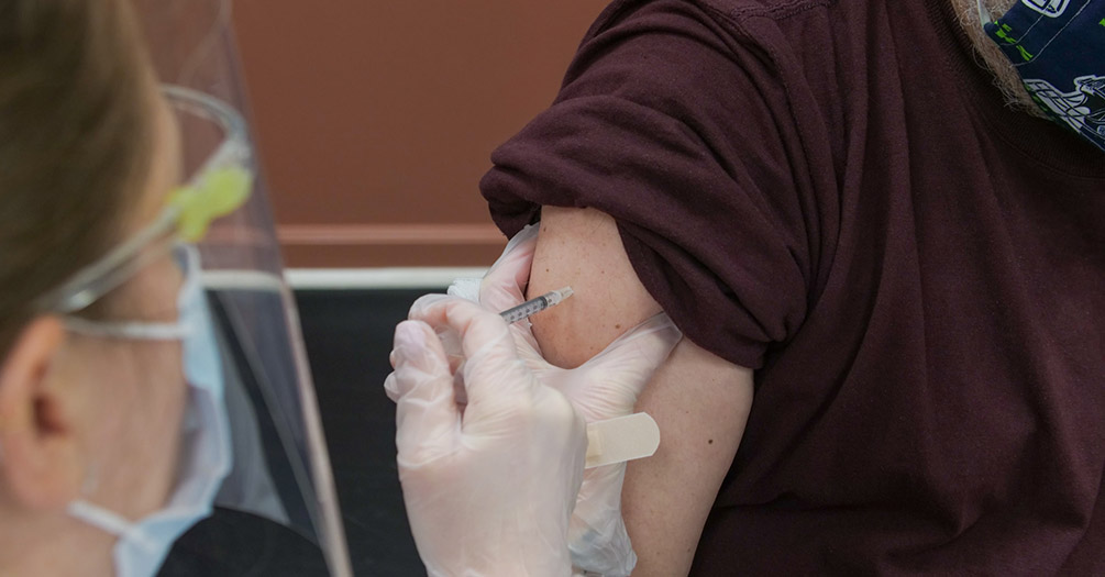 person getting vaccinated