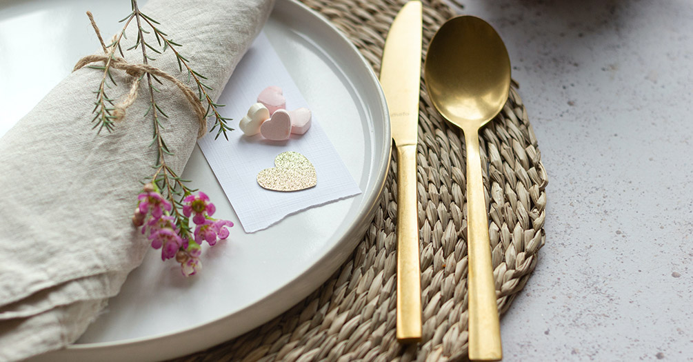 Table with a plate and silverware.