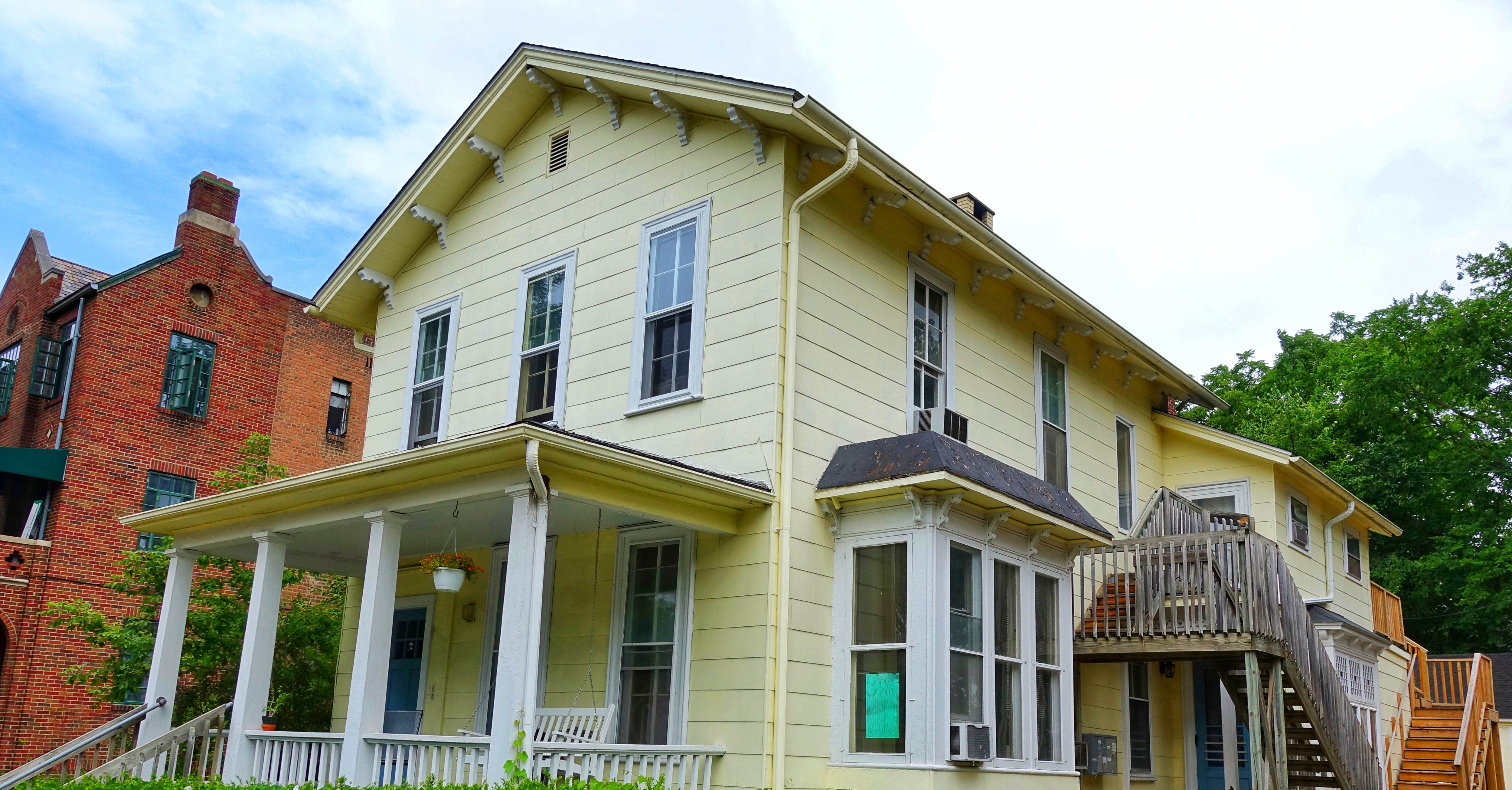 A yellow two-story home in Detroit