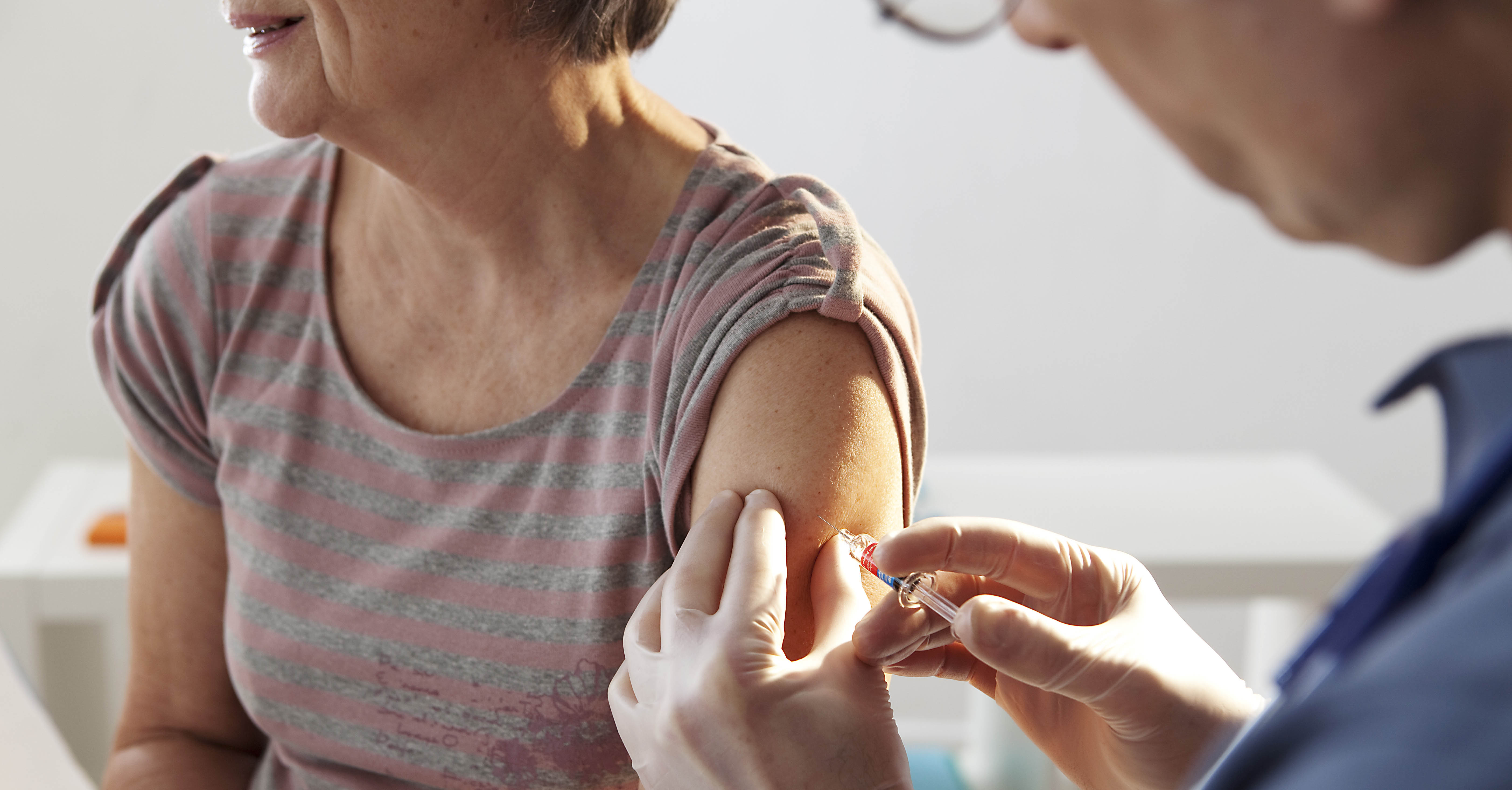 A person receives a vaccination.