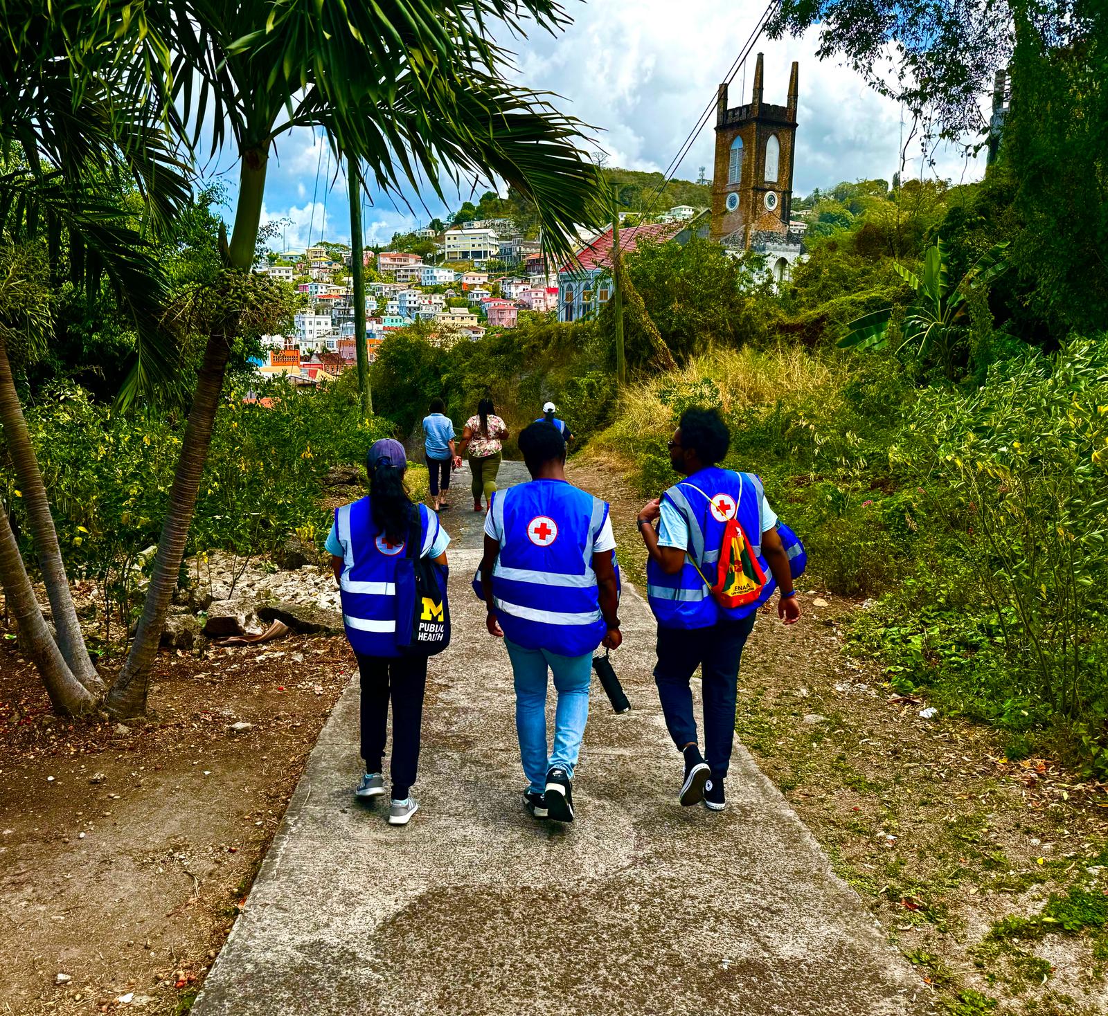 University of Michigan PHAST students enter the city center of St. George's parish to conduct community surveys. 