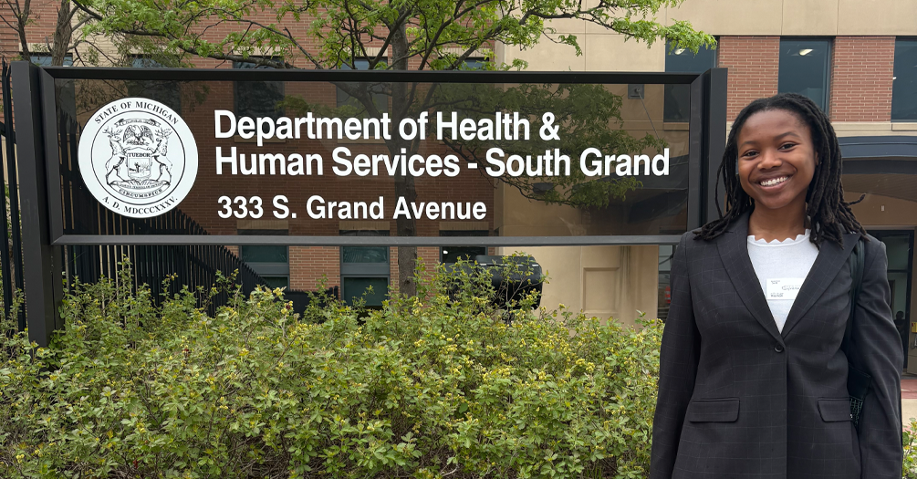 Cyrena Matingou outside of the Department of Health & Human Services building